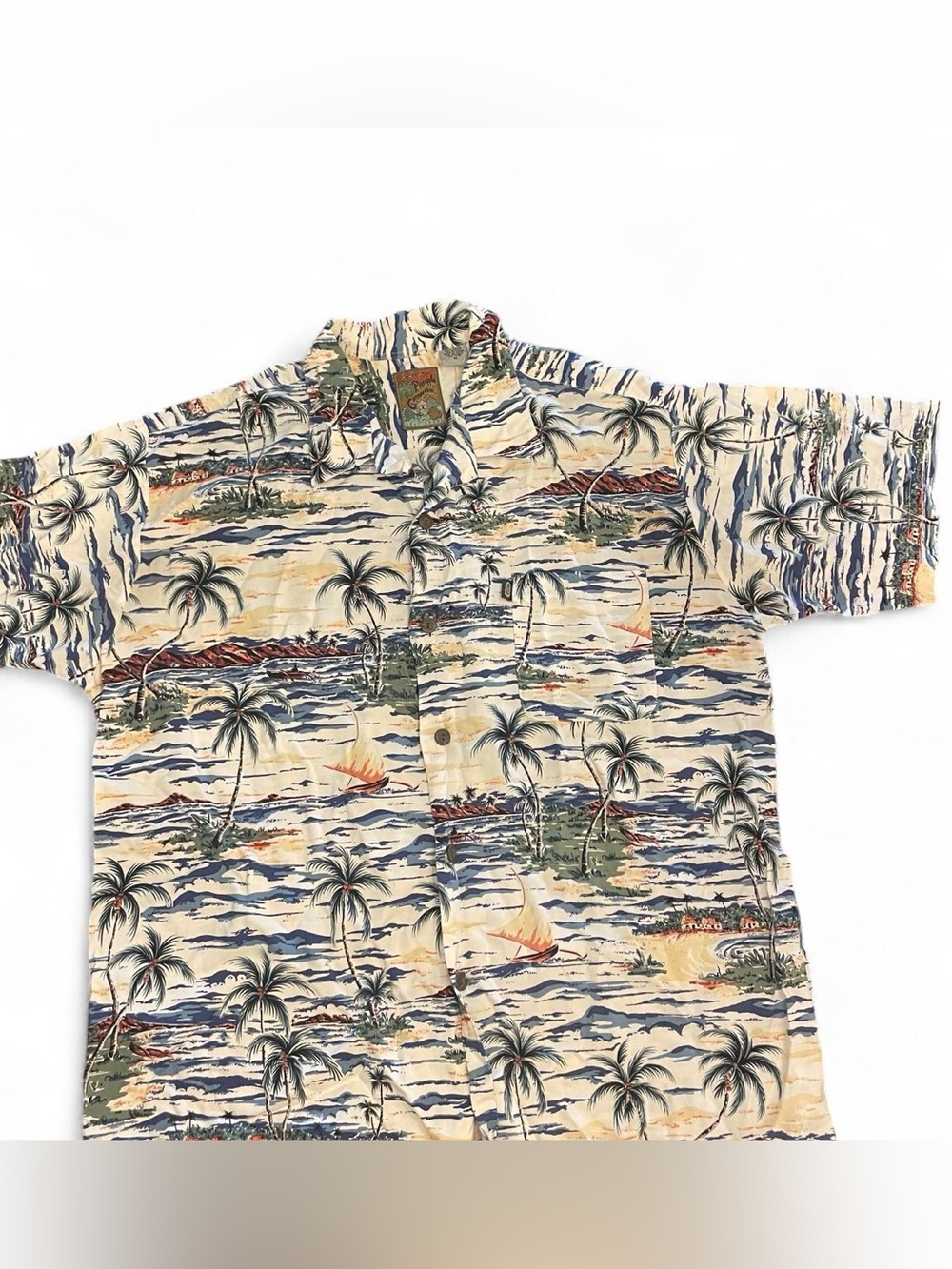 Pineapple Connection Hawaiian shirt with palm trees, sailboats, and tropical